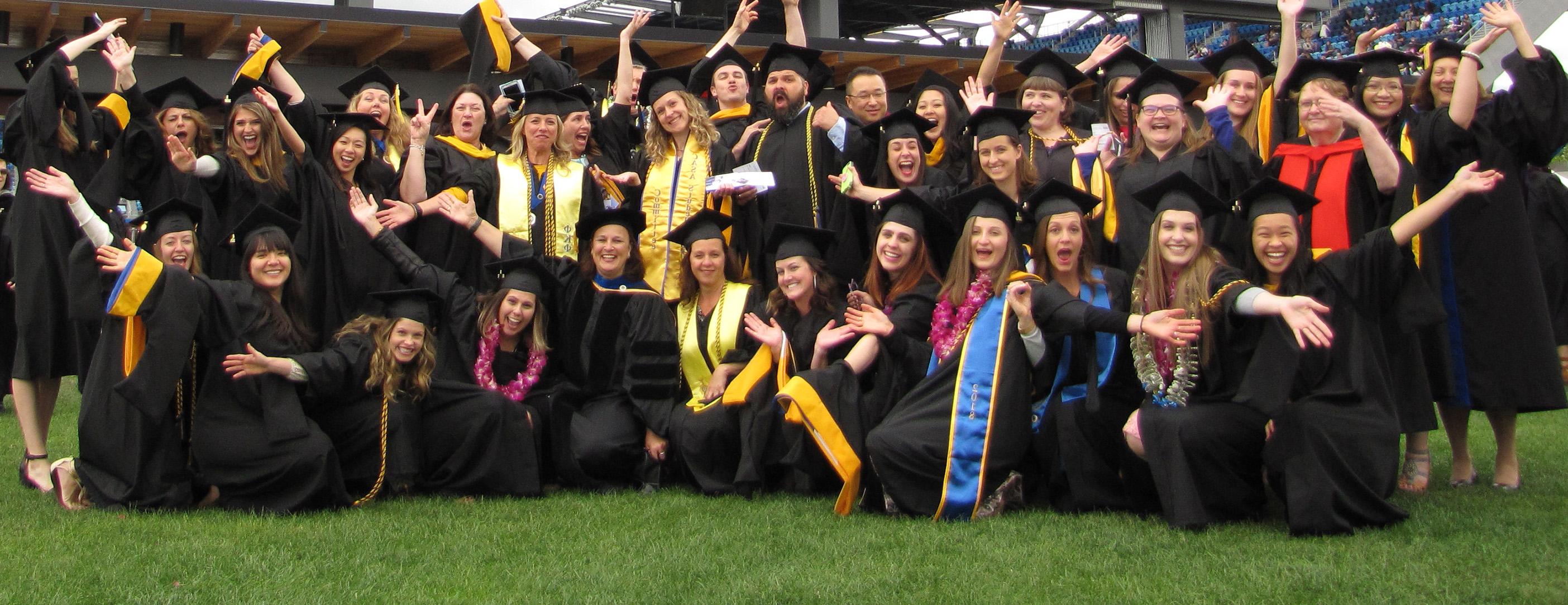 Students posing for a graduation picture